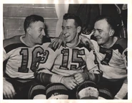 Art Jackson, Milt Schmidt and Eddie Wiseman celebrate the 1941 Bruins Cup win.