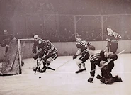 Action from Black Hawks-Americans game.
