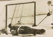 Ab McDonald scores the Cup winning goal on Hank Bassen, Game 6 of the 1961 Stanley Cup Finals, April 16, 1961.