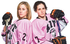 right RIT Tigers Pink in the Rink jerseys