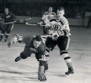 Paul Henderson and Bobby Orr in 1966-67 season action.