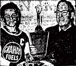MacLeish receives a trophy in 1962.