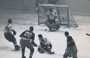 Rangers Ed Slowinski scores on Jack Gelineau, October 26, 1949.