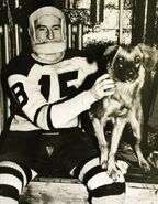 Milt Schmidt wearing protection for his broken jaw, January 1938.