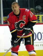 Iginla stands near the boards, without his helmet, during a pre-game warm-up.