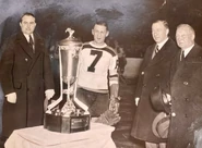 Weston Adams, Cooney Weiland, Art Ross, Frank Calder at the presentation of the Prince of Wales Trophy, March 14, 1939.