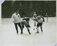 Face-off between Rangers Eddie Rodden and Quakers Herbert Drury on November 23, 1930.