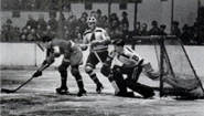 Rangers Phil Watson ends Brimsek's shutout streak while #4 Charlie Sands looks on, December 25, 1938.
