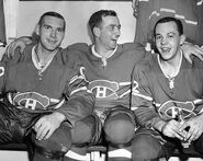 Dave Balon, Dick Duff and Yvan Cournoyer after the Canadiens won the Stanley Cup in 1966.