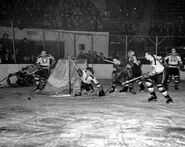 The Kraut Line and #18 Jack Shewchuk in action against the Rangers, November 15, 1941.