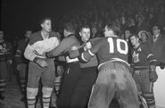 George Armstrong gives Béliveau his first fight, December 8, 1955.