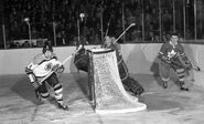 Johnny Bower, Carl Brewer and Bronco Horvath (wearing his jaw protector), January 10, 1959.