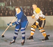 Dave Keon and Tom Johnson in 1964-65 season action.