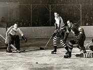 Earl Robertson, Nick Knott, Sweeney Schriner, November 30, 1941.