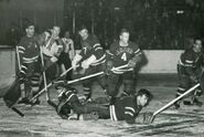 Chuck Rayner, #7 Phil Watson, #4 Rene Trudell and the Bruins #11 Don Gallinger, March 2, 1947.