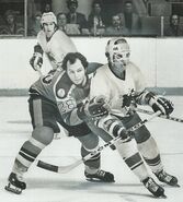 Paul Henderson (wearing a cage to protect his broken nose) and Jim Hargreaves, January 10, 1975.