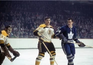 Bernie Parent, Gilles Marotte and Dave Keon in 1965-66 season action.