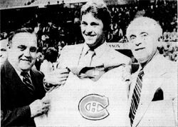 First overall pick Doug Wickenheiser (center) with the Canadiens' Claude Ruel (right) and Irving Grundman.