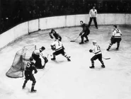 Bruins Brimsek, #5 Clapper, #19 Crawford and #12 Hollett hold off Leafs #15 Metz, Game 5 of the 1939 Finals, April 16, 1939.
