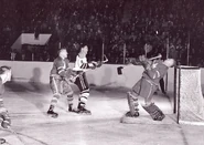 Johnny Wilson, John Bucyk and Johnny Bower in 1959-60 action.