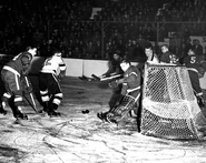 19Mar1946-Lumley Guidolin Gallinger.jpg (91 KB) #12 Bep Guidolin and #11 Don Gallinger challenge Red Wings goalie Harry Lumley in Game 1 of the 1946 Semi-finals, March 19, 1946.