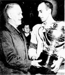 Windsor Bulldogs' captain Lou Bendo holds the Bolton Cup after his team defeated the Moncton Hawks.