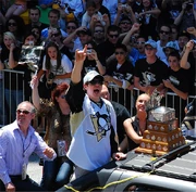 Malkin, along with his parents (left), during the Penguins' victory parade for their 2009 Stanley Cup victory