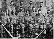 Winnipeg Monarchs with the Allan Cup in 1915. Back row, from left: Walter Robertson (trainer), , , Harry Stuart. Front row, from left: , Reg Hay, Frank Cadham, , , , .