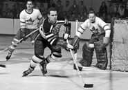 Bob Baun, Larry Regan, Ed Chadwick in 1956-57 season action.