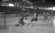 John Bucyk scores on Gump Worsley during the Bruins 12-4 romp in Geneva, May 3, 1959.