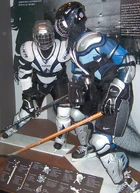 Models with the protective equipment worn by ice hockey skaters; such as a helmet, shoulder pads, elbow pads, gloves, hockey pants, and shin guards.