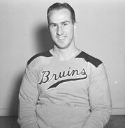 Herb Cain in the gold jersey introduced in 1940.