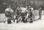 A scrum from the deciding game of the 1938 Semi-finals won by the Black Hawks over the Americans 3-2, April 3, 1938. #6 is Nels Stewart.