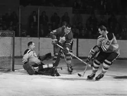 Bob Perreault and #21 Jerry Toppazzini battle Leafs Dave Keon, December 15, 1962.