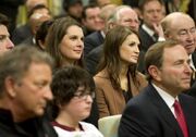 January 28, 2012:  (left) and Meghan Mikkelson (right) are seated behind  in the ballroom at Rideau Hall during the launch of the first ever NHL Hockey is for Everyone program in Ottawa. This was part of the NHL All-Star festivities commemorating the  in Ottawa.