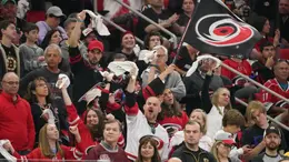 Hurricanes fans cheer on their team even during when there's rough times.