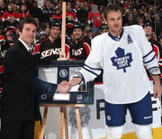 February 28, 2009: Richardson receives a gift from Maple Leafs assistant  during a pregame ceremony honoring his retirement.