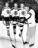 Warren Godfrey, Jean-Guy Gendron, Irv Spencer and Phil Watson at training camp, September 10, 1962.
