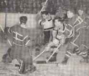 #9 Joe Carveth, #15 Milt Schmidt are stopped by Canadiens Bill Durnan and Hubert Macey during a 1947 playoff game.