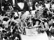 John McKenzie, Fred Stanfield, John Bucyk, Ted Green during the Cup parade, May 11, 1970.