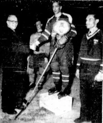 Canadian captain Hec Negrello presented with trophy