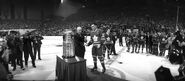 Clarence Campbell presents the 1964 Stanley Cup to Leafs Captain George Armstrong.
