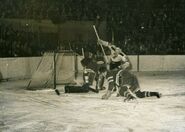 Terry Reardon avoids Chuck Rayner, December 29, 1946.