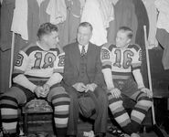 Brothers Busher and Art Jackson, seen here with Art Ross, played for the Bruins for 3 seasons beginning in 1942.