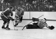 Murray Hall scores on George Gardner as Ralph MacSweyn looks on, March 27, 1974.