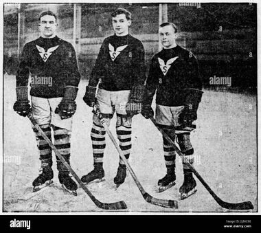Ice-hockey-players-raymie-skilton-left-tom-molyneux-center-and-alfred-brownie-baker-right-with-the-sherbrooke-saints-ca-1913-2J8XC60