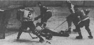 Eddie Shore clears the net, January 2, 1938.