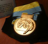 A gold medal that was awarded at the 
