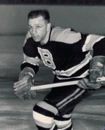 Woody Dumart retired in the 1954-55 season.