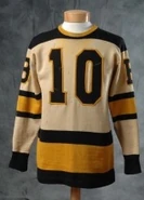 Bill Cowley's 1938-39 jersey. Note the solid black shoulder yolks.